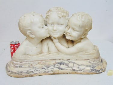 Carved marble group of three children, signed Gori (Affortunato / Fortunato), white marble top on