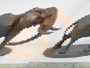 Bronze elephant, signed Mathews, 10" long, 6" wide, 6.75" tall.