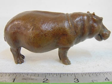 Small bronze hippo, signed illegibly, 4.5" long