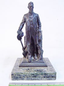 Bronze figure of Ezra Cornell by Herman MacNeil, bronze in dark patina on marble base, 7.75" wide,