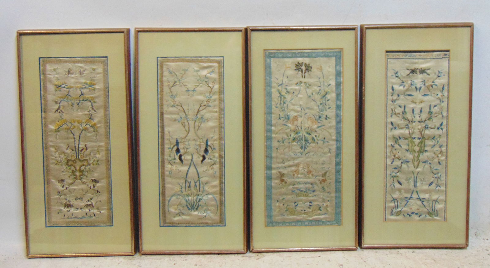 Set 4 Chinese framed embroideries on silk, floral scenes with birds, decorations, each scene is: Set 4 Chinese framed embroideries on silk, floral scenes with birds, decorations, each scene is 21.5" by 9.5" (note, sizes vary slightly), framed size is 28" by 13.5"