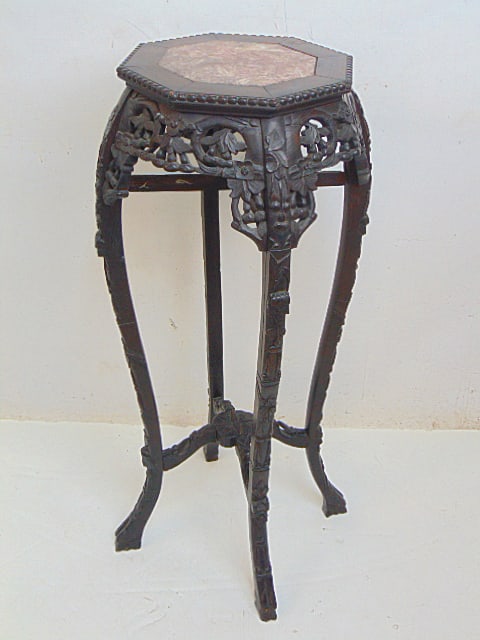 Chinese plantstand, carved base & marble top, octagonal top, one carved corner piece is loose,: Chinese plantstand, carved base & marble top, octagonal top, one carved corner piece is loose, height is 35.5"