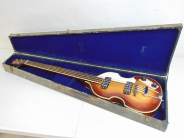 Electric bass guitar by Hofner, made in Japan, in wood case, guitar is 42.5" long