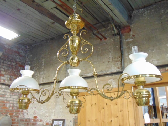 Large brass pool table fixture with milk glass shades & chimneys, one shade is cracked, fixture is: Large brass pool table fixture with milk glass shades & chimneys, one shade is cracked, fixture is 35" tall, 57" long