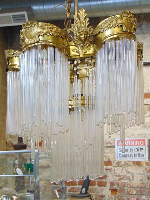 Hector Guimard style bronze & crystal hanging fixture, center ring with hanging crystals surrounded: Hector Guimard style bronze & crystal hanging fixture, center ring with hanging crystals surrounded by 5 exterior rings with matching hanging crystals, decorated with faces, chandelier is 20" tall, 18