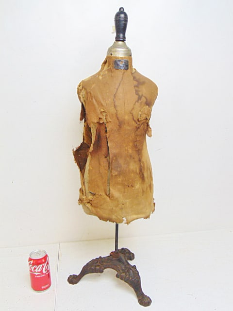 Vintage child size dress form on cast iron base, labeled, "S.N. Urford & Sons (unsure, label: Vintage child size dress form on cast iron base, labeled, "S.N. Urford & Sons (unsure, label damaged), Papier Mache & Wire Forms 43 West Street, Boston" 34' tall,