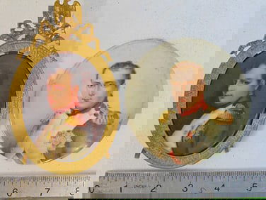 Two small portraits of Napoleon on porcelain, one in gilt bronze frame, round unframed portrait