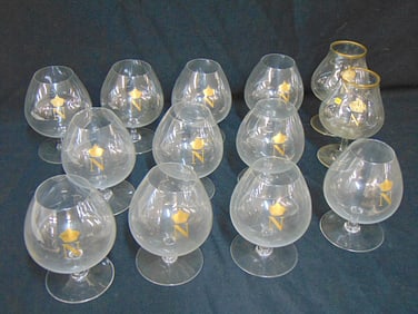 Set of 11 Baccarat crystal Napoleon brandy glasses, "Perfection" pattern featuring the gold crowned