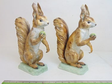 Pair bisque porcelain squirrel form nut jars, signed Mada, with "Seugnot 28 rue du Bac, Paris"