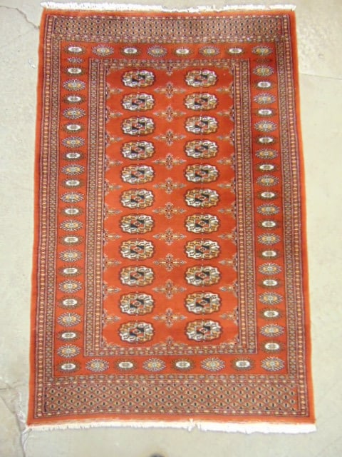 Bokhara scatter rug in brown, carpet is 60" by 39": Bokhara scatter rug in brown, carpet is 60" by 39"