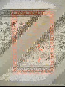 Small silk rug with Persian hunt scenes, carpet is 27" by 18.5"