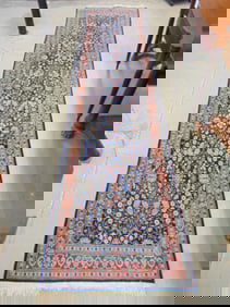 Floral decorated runner carpet, label states Sogucak, hand made, rug is 12 feet long, 36" wide