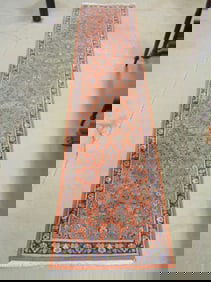Persian runner with floral decorations & border, salmon colored, carpet is 10'4" by 28"