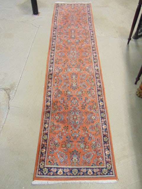 Persian runner with floral decorations & border, salmon colored, carpet is 10'4" by 28": Persian runner with floral decorations & border, salmon colored, carpet is 10'4" by 28"