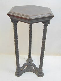 carved base plantstand, hexagonal top with carved edge, stand is 17.5" wide (widest point), height