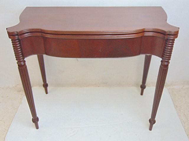 Mahogany swing leg console table, table is 34.75" by 16.5" (closed), height is 29.25", in good: Mahogany swing leg console table, table is 34.75" by 16.5" (closed), height is 29.25", in good condition.
