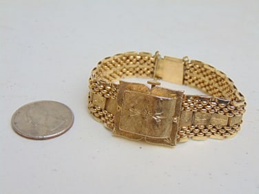 Jewelry. Gold 14kt Vintage bracelet hidden watch Sellita lady's wristwatch, 35.80 grams total
