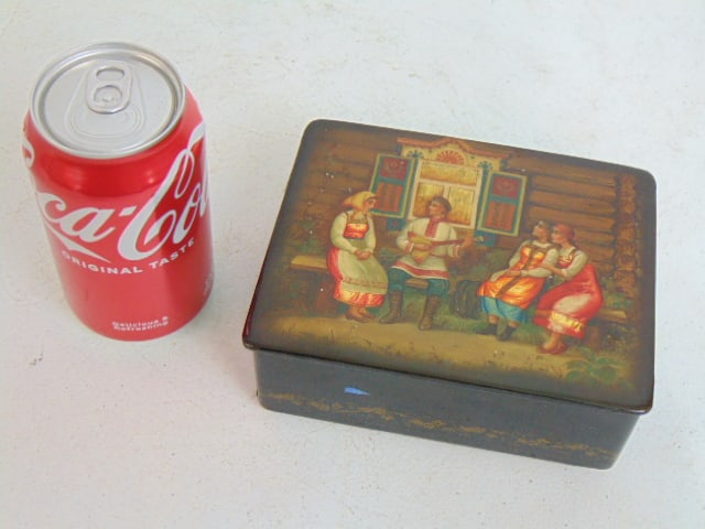 Russian lacquered box with decorative painted lid, figure playing music, 6" by 4.75", height is: Russian lacquered box with decorative painted lid, figure playing music, 6" by 4.75", height is 2.25"