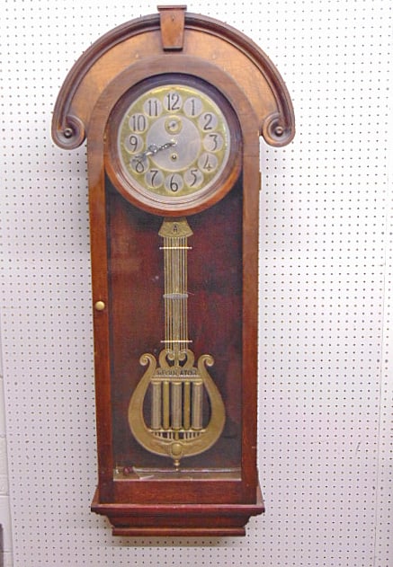 Ansonia wall regulator, brass & steel dial, elaborate pendulum, in German style, clock has single (1 of 6)