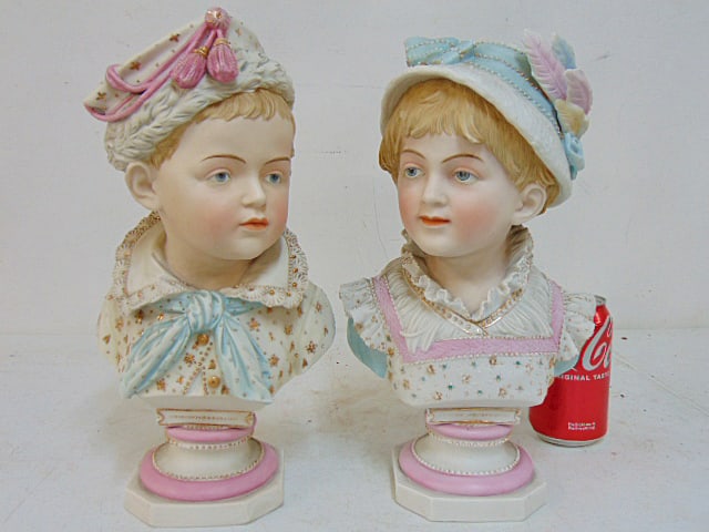 Pair bisque porcelain German busts of young boy & girl, in pastel colors, 13" tall, in good: Pair bisque porcelain German busts of young boy & girl, in pastel colors, 13" tall, in good condition