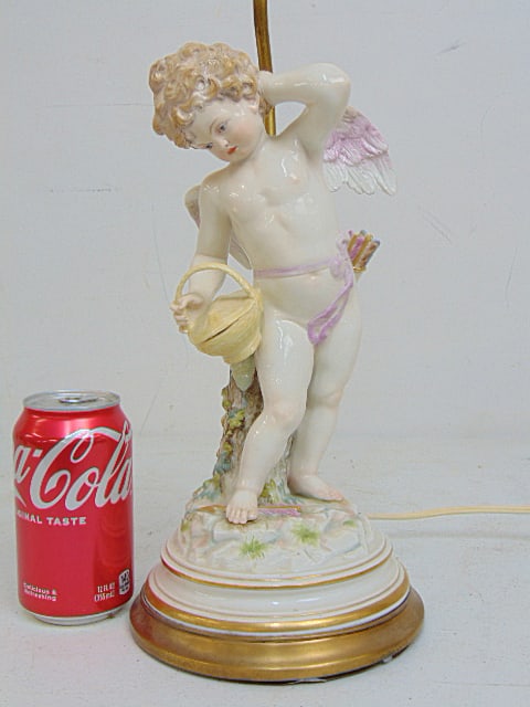 Meissen porcelain figural lamp, statue cupid standing on arrow holding a basket, base to top statue (1 of 7)