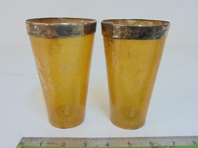 2 horn cups with silver rims, height is 5 3/8", both are cracked.: 2 horn cups with silver rims, height is 5 3/8", both are cracked.