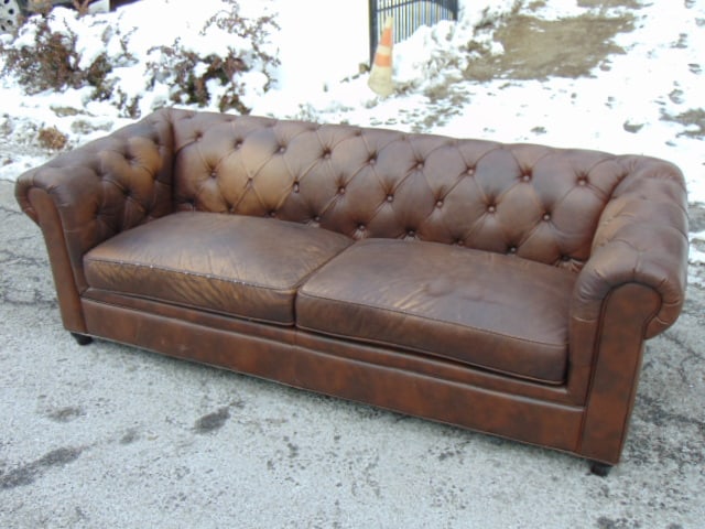 Brown leather Chesterfield sofa, loose seat pillows, sofa is 84" long, 36" deep, 29.5" tall, one (1 of 4)