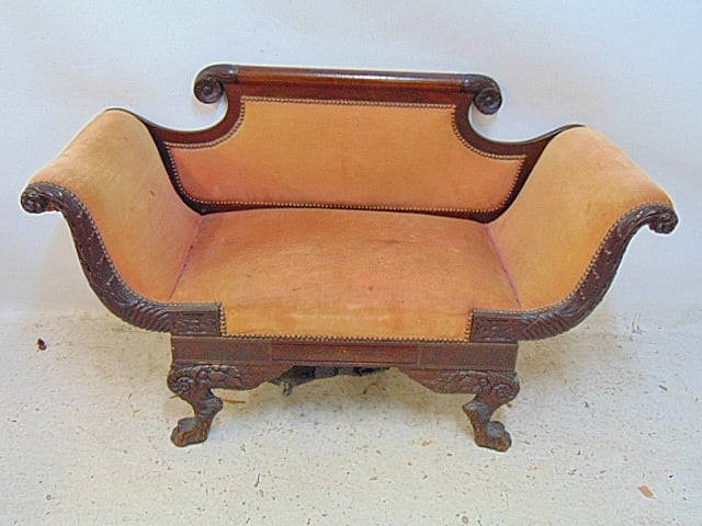 Diminutive empire loveseat with scrolled arms, carved legs, 51" by 19", height is 31", some breaks: Diminutive empire loveseat with scrolled arms, carved legs, 51" by 19", height is 31", some breaks in the frame, arms loose.