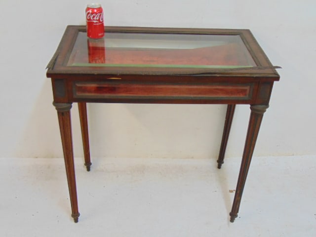 French style collection vitrine, bronze trim, top is 29.5" by 17", height is 29", some bronze trim: French style collection vitrine, bronze trim, top is 29.5" by 17", height is 29", some bronze trim is loose as well as some loose joints, beveled glass. needs restoration