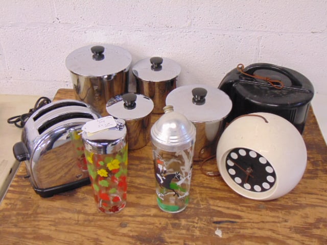 Chrome toaster, chrome lidded canisters, shakers, clock: Chrome toaster, chrome lidded canisters, shakers, clock