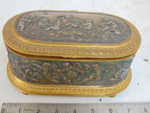 Mixed metal oval jewel box with putti decorations, silverplate & brass, 7.75"m wide, 4" wide, height (1 of 5)