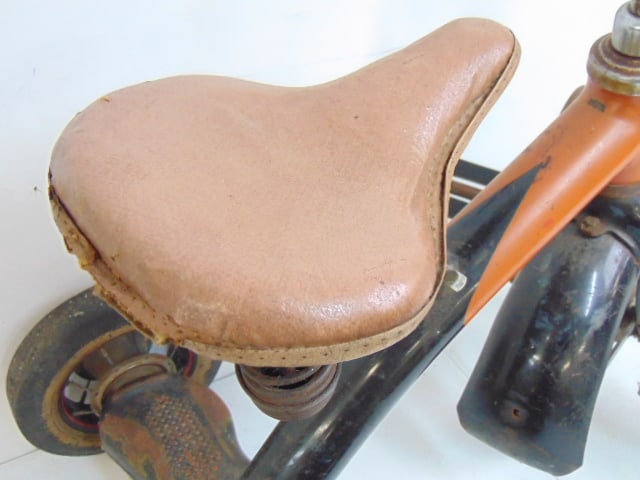 Vintage child's tricycle, spring mounted seat, tires worn, 26" long, 18.5" wide, height is 24" - 5