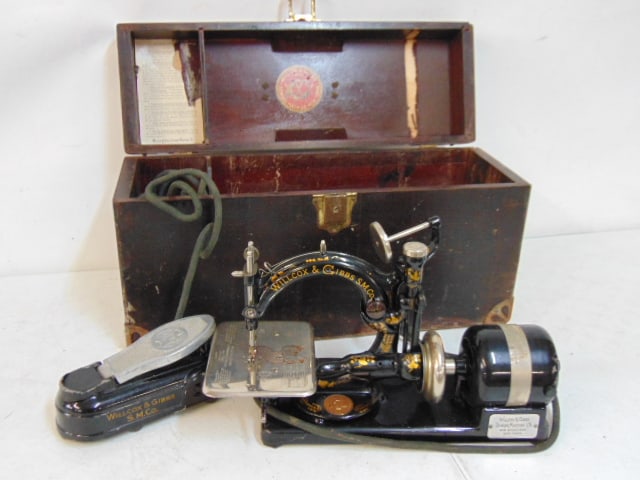 Sewing machine, Wilcox & Gibbs Sewing Machine Co, New York, in original wood case, (1 of 5)