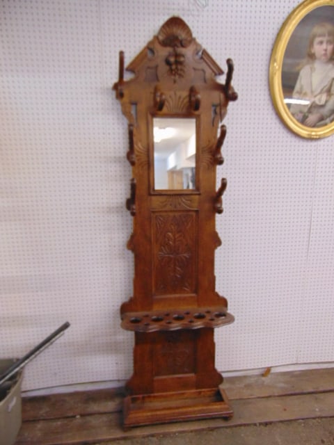 Oak hall tree with 6 hooks, mirror & carved detail, height is 87": Oak hall tree with 6 hooks, mirror & carved detail, height is 87"