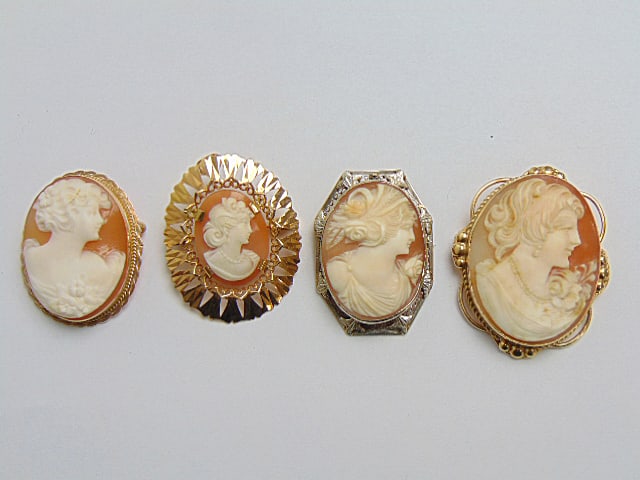 Jewelry. (4) Gold Cameos/brooches, 18kt & 14kt, to include 14k white gold carved 6.85 grams; 14k: Jewelry. (4) Gold Cameos/brooches, 18kt & 14kt, to include 14k white gold carved 6.85 grams; 14k carved cameo lady w/ earrings & necklace, 9.10 grams; 18kt tested smallest cameo with gold frame tested