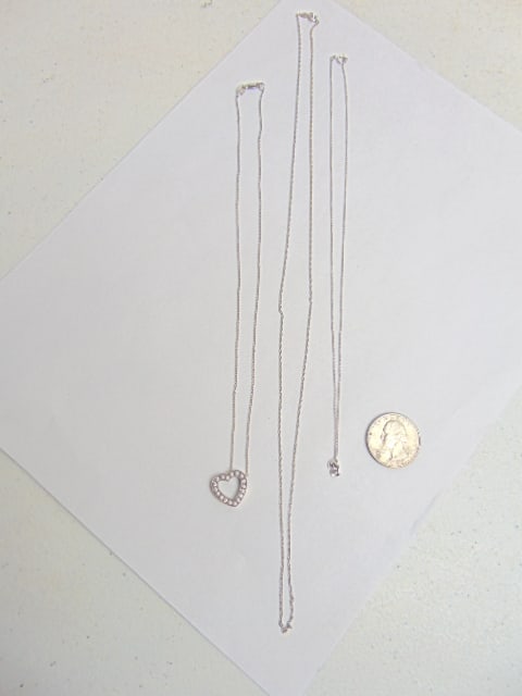 Jewelry. (3) white gold chains/necklaces, diamond heart pendant 5.30 grams, & 18k 750 hallmark w/ (1 of 4)