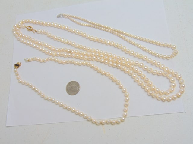 Jewelry. (3) Pearl necklaces, 14k clasp w/ blue gem stones approx. 5mm, hallmark G.H. 585; as is,: Jewelry. (3) Pearl necklaces, 14k clasp w/ blue gem stones approx. 5mm, hallmark G.H. 585; as is, white gold clasp hallmark 10k graduated largest approx. 7mm; opera length pearls w/ 585 hallmark clasp