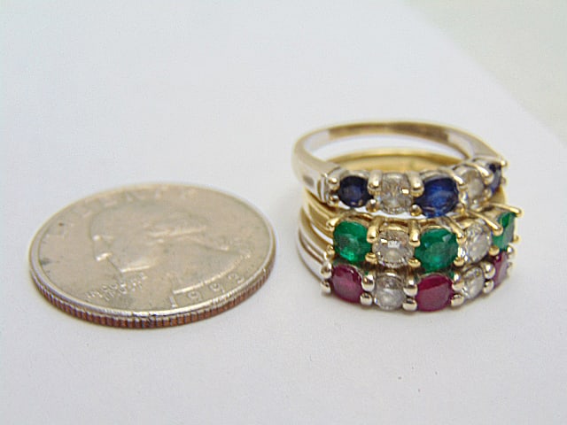 Jewelry. (3) 14kt Gold diamond gemstone bands, two white gold bands each with two diamonds and three: Jewelry. (3) 14kt Gold diamond gemstone bands, two white gold bands each with two diamonds and three rubies, 3.25 grams, size 6 3/4, three sapphires 3.20 grams, size 6 1/2, & 14k yellow gold band w/ t