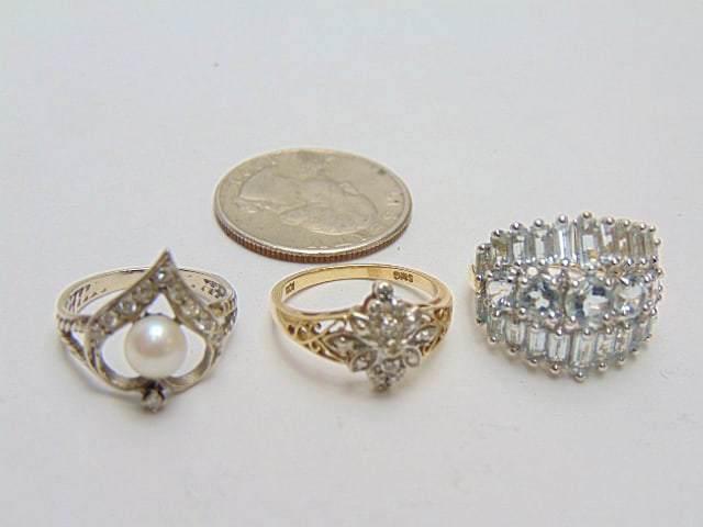 Jewelry. (3) Gold rings, 10kt white gold diamond chip pearl ring, tested 10kt, 2.95 grams, size 5: Jewelry. (3) Gold rings, 10kt white gold diamond chip pearl ring, tested 10kt, 2.95 grams, size 5 1/2; hallmark 14k, SMG diamond chip ring, 2.10 grams, size 6; & 14kt hallmark cz wide band ring hallma