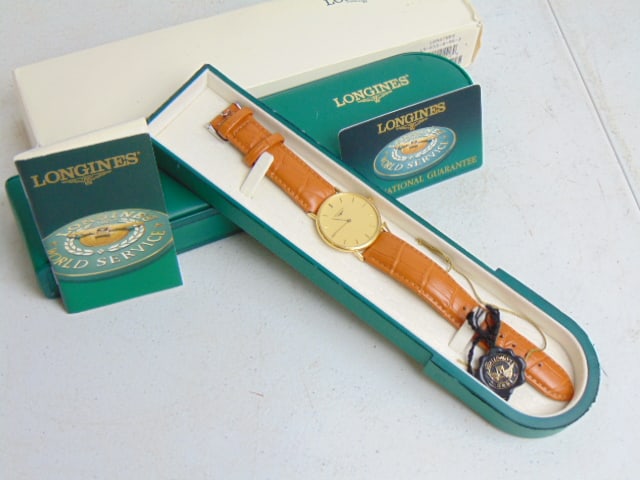 Jewelry. Gold LONGINES 18kt wristwatch, original box & paperwork, 30mm face, no. 27954881, L7 989 6, (1 of 5)