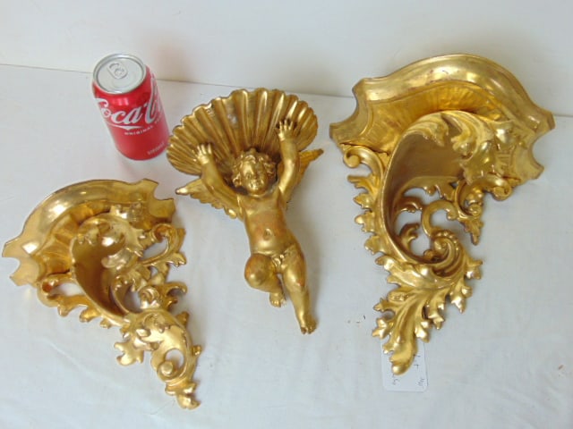 3 carved gilt wood wall shelves, 2 with curls, one with winged putti, largest shelf is 9 7/8" wide, (1 of 7)