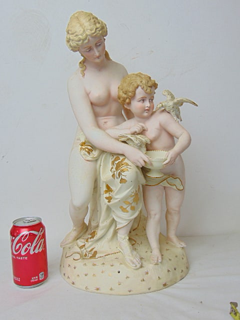 Large bisque porcelain figure, nude woman & young boy feeding hawks, height is 19.5", in good: Large bisque porcelain figure, nude woman & young boy feeding hawks, height is 19.5", in good condition, base marked RW 10.