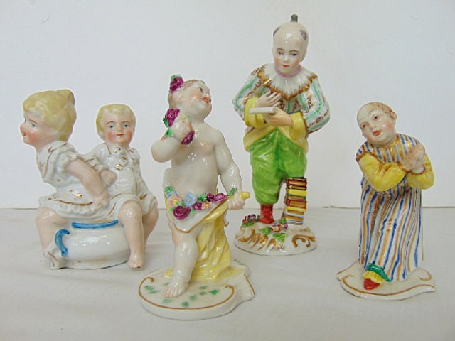 4 small porcelain figurines, one marked Germany, 2 Chinese figures, pair toddlers on a potty & (1 of 7)