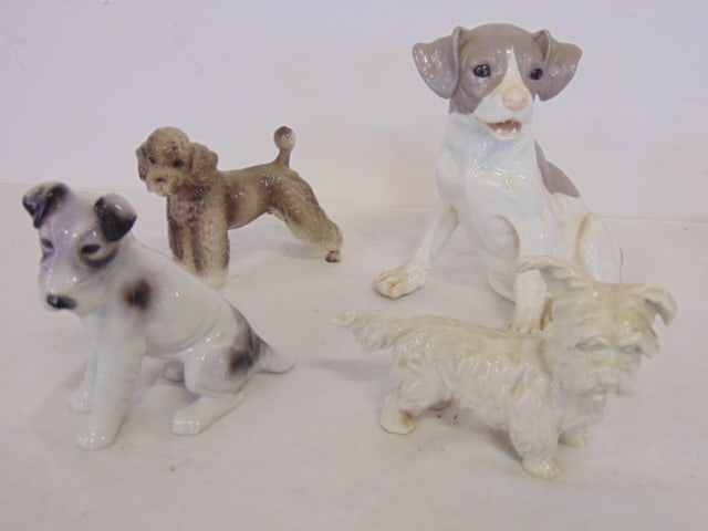 4 porcelain dogs, various makes, largest dog, the pointer is 7.5" tall, all in good condition. (1 of 6)