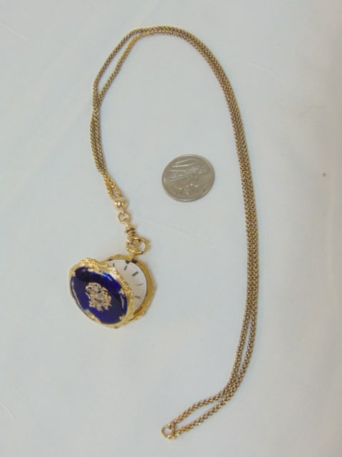 Jewelry. Gold & diamond blue enamel Geneva watch w/ gold chain, watch tested 18kt & chain tested: Jewelry. Gold & diamond blue enamel Geneva watch w/ gold chain, watch tested 18kt & chain tested 14kt, total weight 40.95 grams, watch face is cracked, no crystal, enamel as is, diamond chips on case