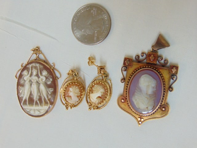Jewelry. Gold Cameo lot to include pair of 14kt post cameo earrings 7.45 grams; carved cameo pendant: Jewelry. Gold Cameo lot to include pair of 14kt post cameo earrings 7.45 grams; carved cameo pendant three graces, 6.85 grams, hallmark 14k; & carved cameo carnelian gold pendant tested 14kt gold, 13.