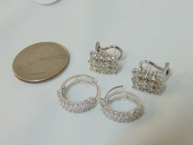 Jewelry. (2) pairs of white gold diamond earrings, hallmark 585, huggy style three row earrings,: Jewelry. (2) pairs of white gold diamond earrings, hallmark 585, huggy style three row earrings, 2.50 grams & square diamond earrings hallmark 14kt, each with 12 stones, 4.90 grams