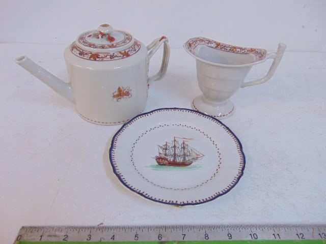 3 pieces export porcelain, plate with sail ship flying US flag, tea pot & creamer, plate is 7.75": 3 pieces export porcelain, plate with sail ship flying US flag, tea pot & creamer, plate is 7.75"