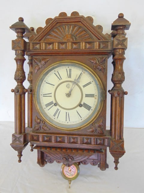 Carved oak Waterbury wall clock, clock is 20" by 14" (1 of 4)