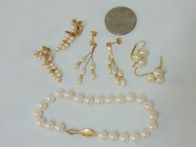 Jewelry. Gold & pearl lot to include pearl bracelet w/ yellow gold clasp hallmark 14k, FIC and thre: Jewelry. Gold & pearl lot to include pearl bracelet w/ yellow gold clasp hallmark 14k, FIC and three pairs of pearl earrings, hallmark 14k w/ small green gemstone, cluster of three pearls hallmark 14k